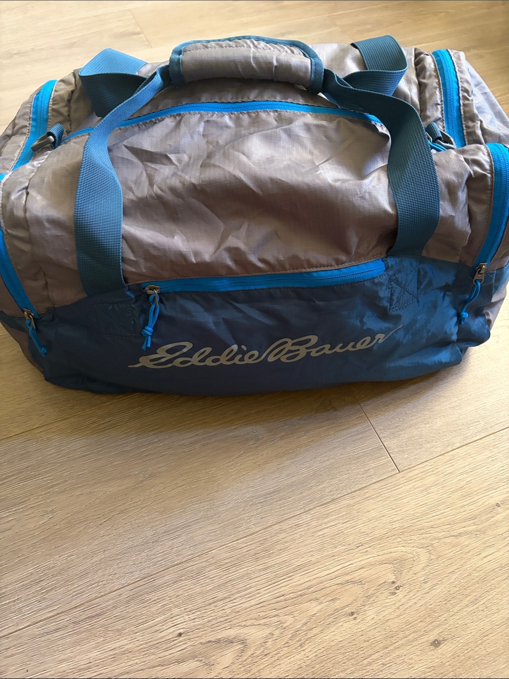Eddie Bauer Blue and Gray Stowaway 40L Duffel Bag